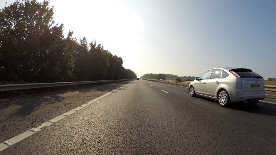 UK hire car - white car traveling on highway in Hatfield England