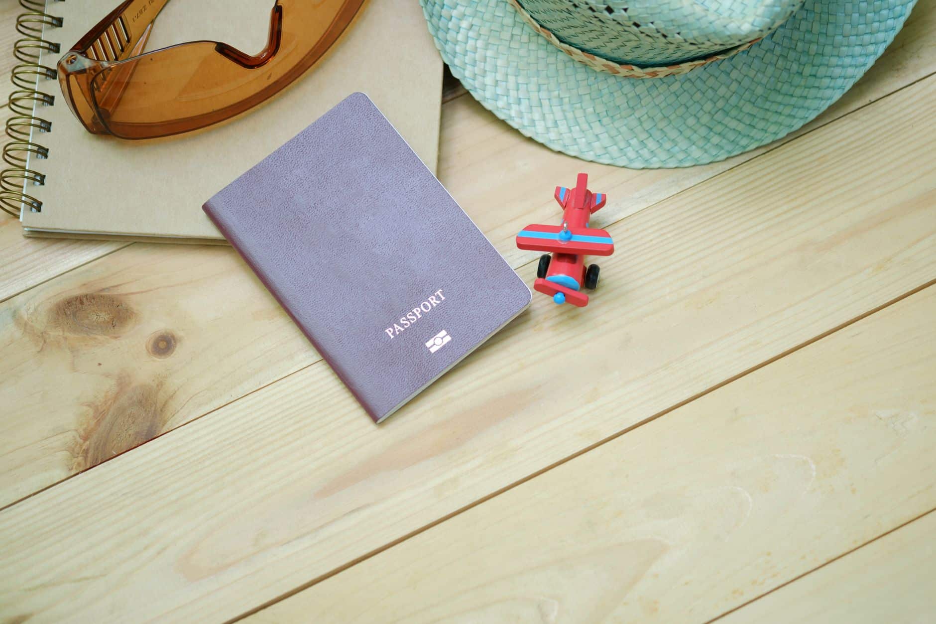 UK passport and travel documents on a table while planning an autumn trip